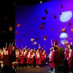 Students of Kenai Central High School celebrate at the end of their graduation ceremony in the schools auditorium in Kenai, Alaska, on Monday, May 13, 2024. (Jake Dye/Peninsula Clarion)
