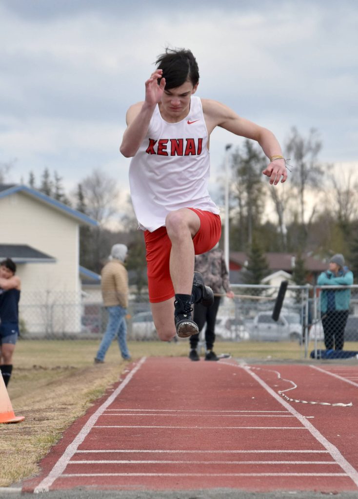 Kenai Centrals Gage Ivy competes in the triple jump Saturday, May 11, 2024, at the Kenai Peninsula Borough meet at Soldotna High School in Soldotna, Alaska. (Photo by Jeff Helminiak/Peninsula Clarion)