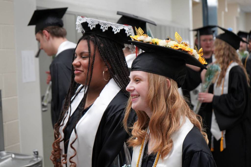 Nikiski Middle/High School graduates proceed into a graduation ceremony in the schools gym in Nikiski, Alaska, on Wednesday, May 15, 2024. (Jake Dye/Peninsula Clarion)