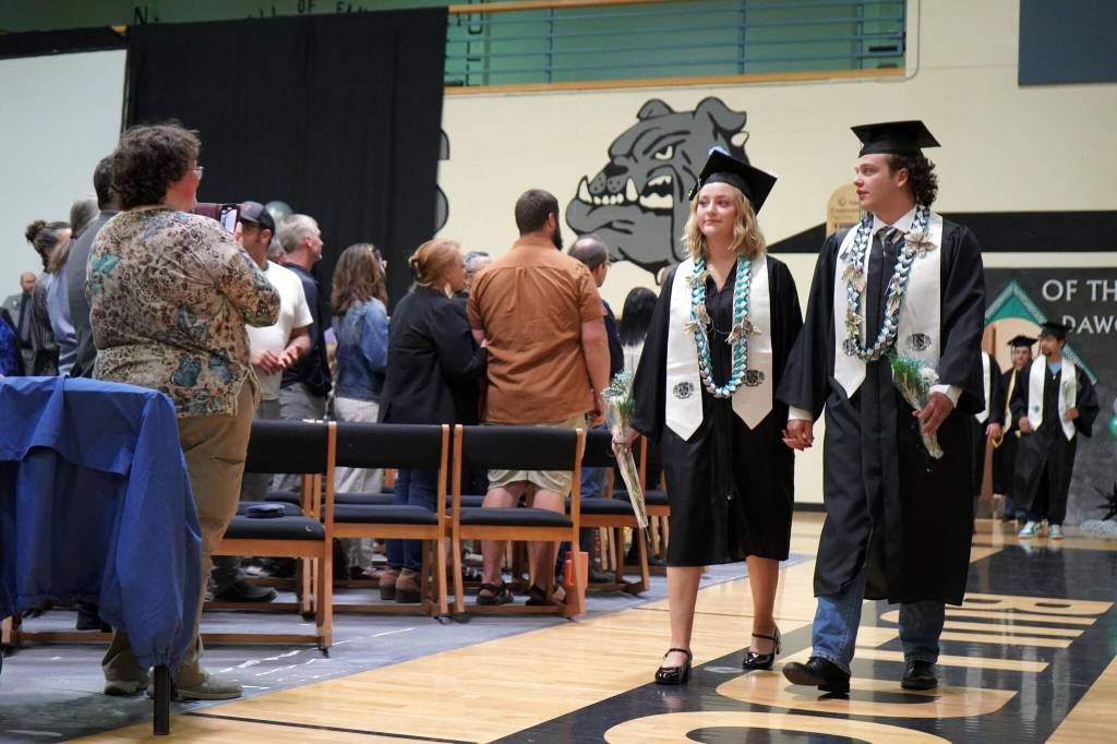 Nikiski Middle/High School graduates proceed into a graduation ceremony in the schools gym in Nikiski, Alaska, on Wednesday, May 15, 2024. (Jake Dye/Peninsula Clarion)