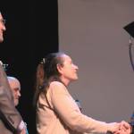 Kenai Peninsula Director of Information Services Eric Soderquist (left) and school board member Diane MacRae (center) congratulate graduates during Connections Homeschools commencement ceremony on Thursday, May 16, 2024 in Soldotna, Alaska. (Ashlyn OHara/Peninsula Clarion)