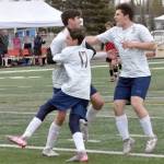 Soldotnas Andrew Arthur celebrates his goal with Lane Hillyer (17) and Gehret Medcoff (5) on Saturday, May 18, 2024, at the Peninsula Conference tournament at Kenai Central High School in Kenai, Alaska. (Photo by Jeff Helminiak/Peninsula Clarion)