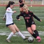 Soldotnas Bay Bloom and Kenai Centrals Brynnen Hanson battle for the ball Saturday, May 18, 2024, at the Peninsula Conference tournament at Kenai Central High School in Kenai, Alaska. (Photo by Jeff Helminiak/Peninsula Clarion)
