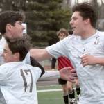 Soldotna's Andrew Arthur celebrates his goal with Lane Hillyer (17) and Gehret Medcoff (5) on Saturday, May 18, 2024, at the Peninsula Conference tournament at Kenai Central High School in Kenai, Alaska. (Photo by Jeff Helminiak/Peninsula Clarion)