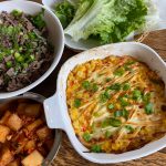 Corn cheese is served alongside grilled beef, kimchi and lettuce. (Photo by Tressa Dale/Peninsula Clarion)