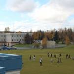 Soldotna Elementary School students play soccer on Friday, Sept. 30, 2022 in Soldotna, Alaska. The Kenai Peninsula Borough School District offices overlook the field. (Ashlyn OHara/Peninsula Clarion)