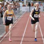Ninilchiks Adelyn McCorison finishes seventh and Homers Beatrix McDonough finishes sixth in the 400-meter dash at the Division II state track and field meet Saturday, May 25, 2024, at Dimond High School in Anchorage, Alaska. (Photo by Jeff Helminiak/Peninsula Clarion)