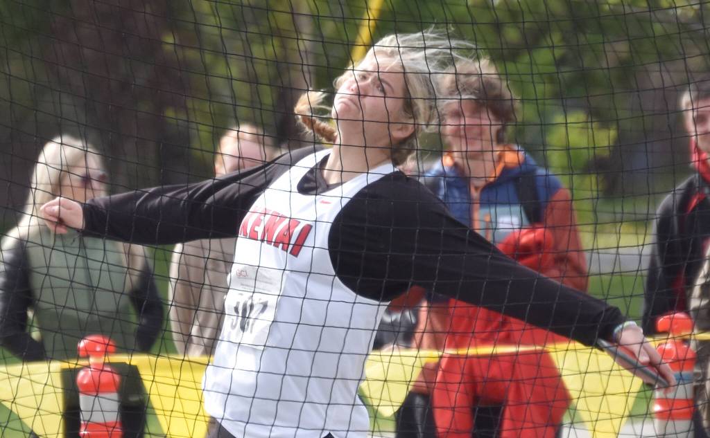 Kenai Centrals Emma Beck wins the discus at the Division II state track and field meet Saturday, May 25, 2024, at Dimond High School in Anchorage, Alaska. (Photo by Jeff Helminiak/Peninsula Clarion)