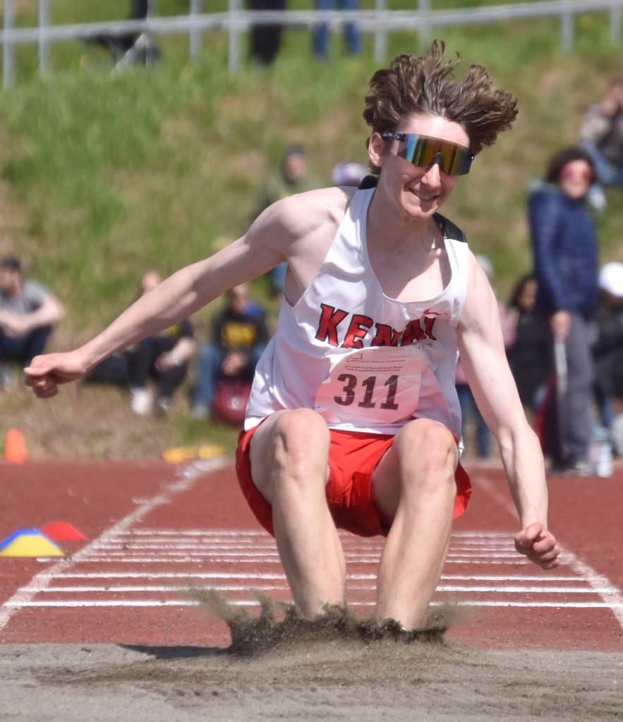 Kenai Centrals Hayden Hughes competes in the triple jump at the Division II state track and field meet Saturday, May 25, 2024, at Dimond High School in Anchorage, Alaska. Hughes won the long jump the day before. (Photo by Jeff Helminiak/Peninsula Clarion)