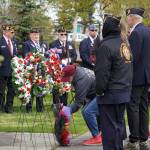 Wreaths are placed honoring fallen soldiers during a Memorial Day ceremony at Leif Hanson Memorial Park in Kenai, Alaska, on Monday, May 27, 2024. (Jake Dye/Peninsula Clarion)