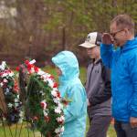 Poppies are affixed to wreaths during a Memorial Day ceremony at Leif Hanson Memorial Park in Kenai, Alaska, on Monday, May 27, 2024. (Jake Dye/Peninsula Clarion)