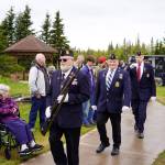 The American Legion Post 20 Color Guard proceeds during a Memorial Day ceremony at the Kenai Cemetery in Kenai, Alaska, on Monday, May 27, 2024. (Jake Dye/Peninsula Clarion)