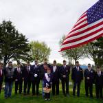 Members of the American Legion Post 20 stand for a photo after a Memorial Day ceremony at the Kenai Cemetery in Kenai, Alaska, on Monday, May 27, 2024. (Jake Dye/Peninsula Clarion)