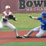 Palmers Reed Craner slids in safe in front of Kenai Centrals Jackson Marion at the third-fifth-place game at the Division II state tournament Saturday, June 1, 2024, at Wasilla High School in Wasilla, Alaska. (Photo by Jeff Helminiak/Peninsula Clarion)