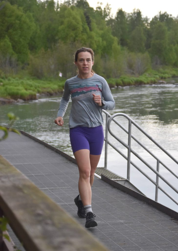 Anchorages Carrie Setian runs along the Kenai River at the Tsalteshi Backyard Ultra on Friday, June 8, 2024, in Soldotna, Alaska. (Photo by Jeff Helminiak/Peninsula Clarion)