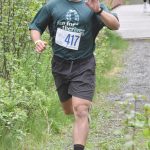 Mikey Stone runs to victory in the 5-kilometer mens race at the Run for the River on Saturday, June 8, 2024, in Soldotna, Alaska. (Photo by Jeff Helminiak/Peninsula Clarion)