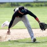 Oilers shortstop Petey Soto tries to bare-hand a ground ball during a 9-2 loss to the Mat-Su Miners on Sunday, June 9, 2024, at Hermon Brothers Field in Palmer, Alaska. (Photo by Jeremiah Bartz/Frontiersman)