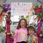Rylee Smith operates her lemonade stand, Lemony Smith, outside of Orange Poppy in Soldotna during Lemonade Day on Saturday. (Jake Dye/Peninsula Clarion)