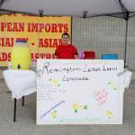 Remington operates his lemonade stand, Remingtons Lemon Lovin Lemonade, outside of Save U More near Soldotna, Alaska, during Lemonade Day on Saturday, June 8, 2024. (Jake Dye/Peninsula Clarion)
