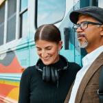 Cora Rose and José Luis Vílchez with their retired school bus-turned-art and recording studio. (Photo provided by Art We There Yet)