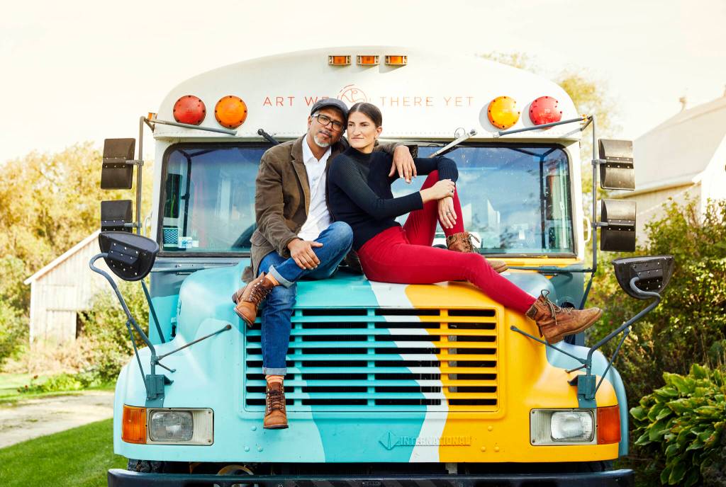 José Luis Vílchez and Cora Rose with their retired school bus-turned-art and recording studio. (Photo provided by Art We There Yet)