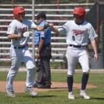 Trenton Ohnemus (27) drove in Derrick Jones (8) with the winning run for the American Legion Post 20 Twins against Dimond Lynx Post 21 on Saturday, June 15, 2024, at Coral Seymour Memorial Park in Kenai, Alaska. (Photo by Jeff Helminiak/Peninsula Clarion)