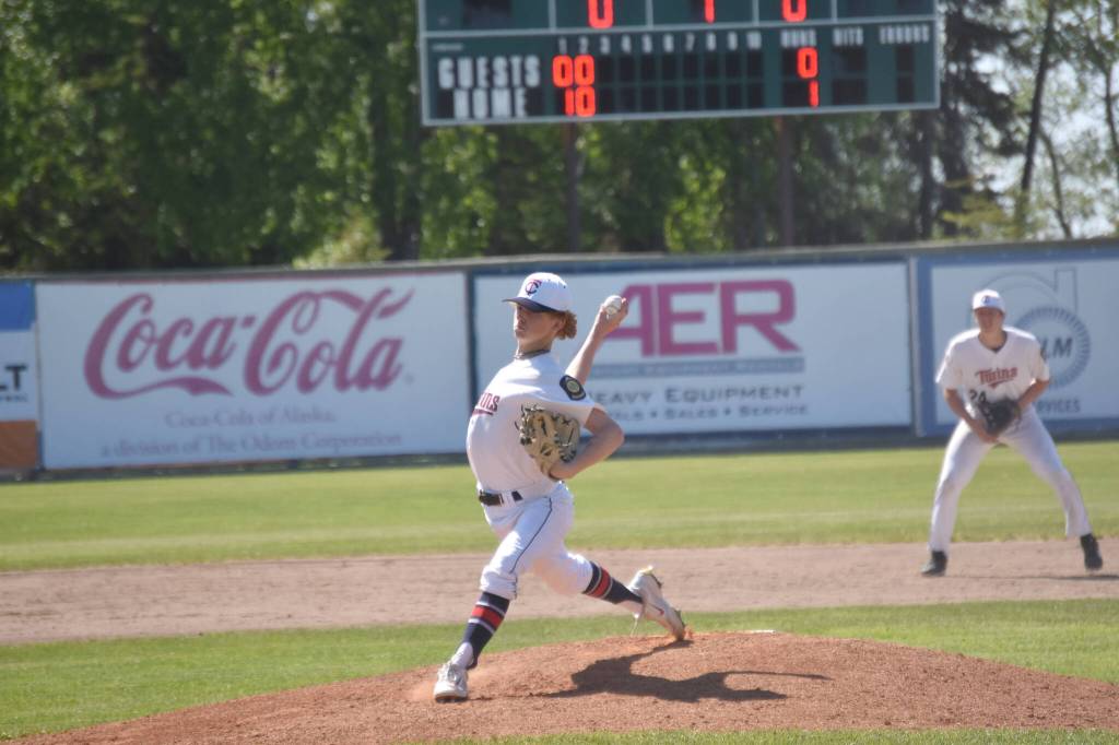 Malakai Olson of the American Legion Post 20 Twins delivers to Dimond Lynx Post 21 on Saturday, June 15, 2024, at Coral Seymour Memorial Park in Kenai, Alaska. (Photo by Jeff Helminiak/Peninsula Clarion)