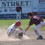 Matthew Schilling of the American Legion Post 20 Twins steals second base against Dimond Lynx Post 21 second baseman Shane Flannery on Saturday, June 15, 2024, at Coral Seymour Memorial Park in Kenai, Alaska. (Photo by Jeff Helminiak/Peninsula Clarion)