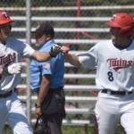 Trenton Ohnemus (27) drove in Derrick Jones (8) with the winning run for the American Legion Post 20 Twins against Dimond Lynx Post 21 on Saturday, June 15, 2024, at Coral Seymour Memorial Park in Kenai, Alaska. (Photo by Jeff Helminiak/Peninsula Clarion)