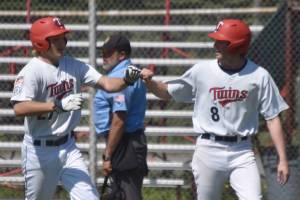 Trenton Ohnemus (27) drove in Derrick Jones (8) with the winning run for the American Legion Post 20 Twins against Dimond Lynx Post 21 on Saturday, June 15, 2024, at Coral Seymour Memorial Park in Kenai, Alaska. (Photo by Jeff Helminiak/Peninsula Clarion)