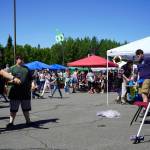 Attendees participate in carnival games during North Peninsula Recreation Service Areas Family Fun in the Midnight Sun at the Nikiski Community Recreation Center in Nikiski, Alaska, on Saturday, June 15, 2024. (Jake Dye/Peninsula Clarion)