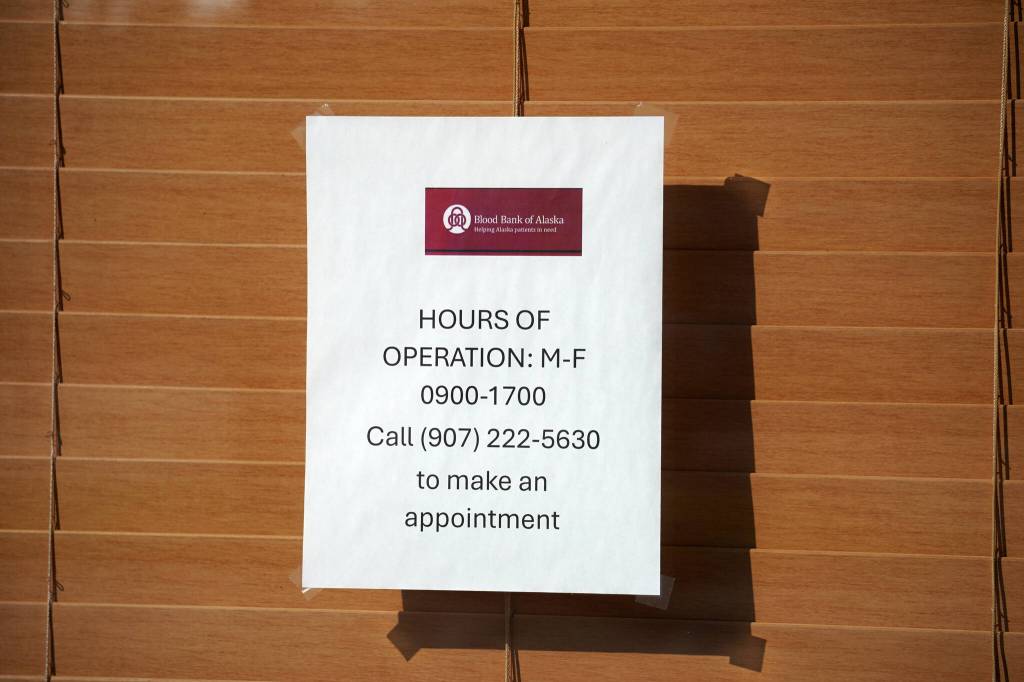 A sign shows hours of operation for the Blood Bank of Alaskas new Kenai Peninsula center in Soldotna, Alaska, on Monday, June 17, 2024. (Jake Dye/Peninsula Clarion)