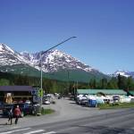 People converge towards the 45th Annual Moose Pass Summer Solstice Festival in Moose Pass on Saturday, June 15. (Jake Dye/Peninsula Clarion)