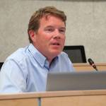 Alaska Department of Transportation Commissioner Ryan Anderson speaks during a town hall meeting on the use of brine on Kenai Peninsula roads, in the Kenai Peninsula Borough Assembly Chambers in Soldotna, Alaska, on Monday, June 17, 2024. (Jake Dye/Peninsula Clarion)