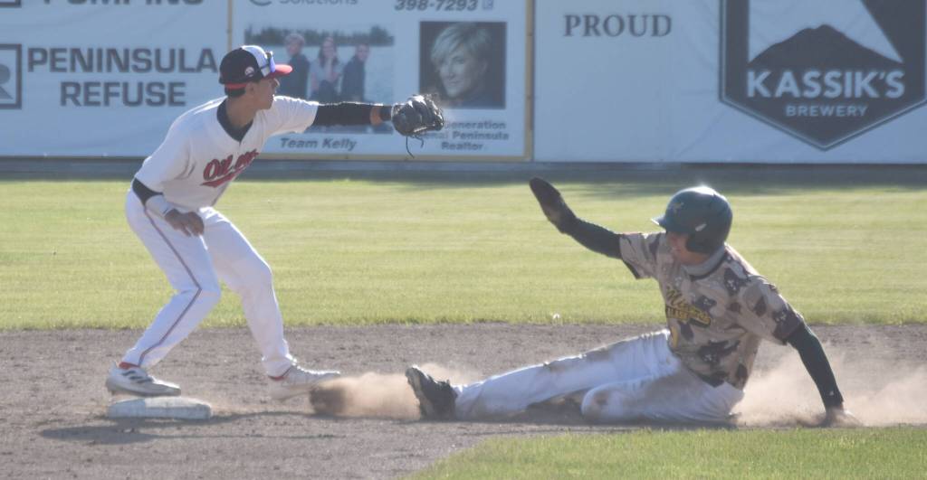 Peninsula Oilers shortstop Petey Soto forces out Christian Perez of the Mat-Su Miners on Tuesday, June 18, 2024, at Coral Seymour Memorial Park in Kenai, Alaska. (Photo by Jeff Helminiak/Peninsula Clarion)