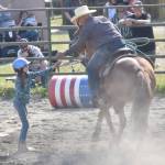 Gabby Bower and Dave Bower compete in Rescue Race on Saturday, June 22, 2024, at the second Soldotna Equestrian Association rodeo of the season at the Soldotna Rodeo Grounds in Soldotna, Alaska. (Photo by Jeff Helminiak/Peninsula Clarion)