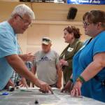 Julia Hanson, design manager for the Sterling Safety Corridor Improvements project, answers questions and takes feedback during a town hall event at the Sterling Community Center in Sterling, Alaska, on Tuesday, June 25, 2024. (Jake Dye/Peninsula Clarion)