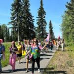 The Two-Spirit March, part of Soldotna Prides Pride in the Park, proceeds along Kalifornsky Beach Road in Soldotna, Alaska, on Saturday, June 22, 2024. (Photo by Michele Vasquez, provided by Soldotna Pride)