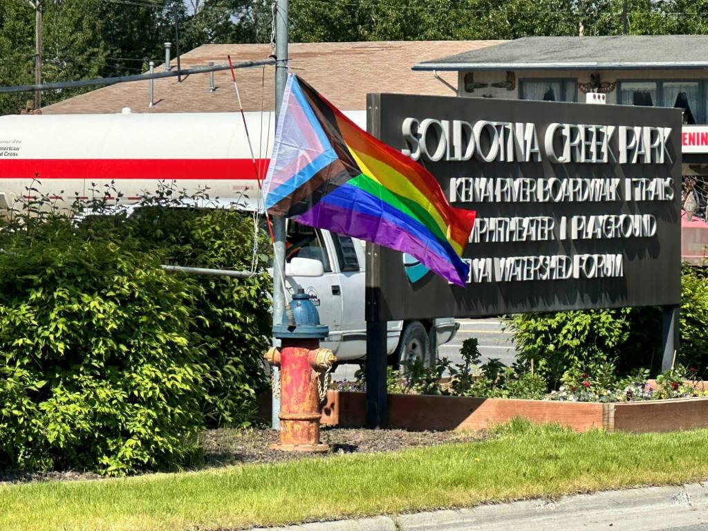 A progress flag flies at Soldotna Creek Park in Soldotna, Alaska, during Soldotna Prides Pride in the Park on Saturday, June 22, 2024. (Photo by Michele Vasquez, provided by Soldotna Pride)