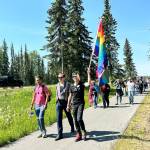 The Two-Spirit March, part of Soldotna Prides Pride in the Park, proceeds along Kalifornsky Beach Road in Soldotna, Alaska, on Saturday, June 22, 2024. (Photo by Michele Vasquez, provided by Soldotna Pride)