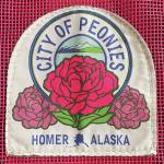 Photo by Emilie Springer/Homer News
Homers official peony patch is attached to a Nomar tote bag, available for purchase at the Homer Chamber of Commerce, during the month of July.