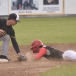 Anchorage Bucs shortstop Will Burns tags out Max Roffwarg of the Peninsula Oilers on a steal attempt Thursday, June 27, 2024, at Coral Seymour Memorial Park in Kenai, Alaska. (Photo by Jeff Helminiak/Peninsula Clarion)