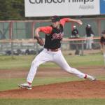Peninsula Oilers starter Jacob Tabor delivers to the Anchorage Bucs on Thursday, June 27, 2024, at Coral Seymour Memorial Park in Kenai, Alaska. (Photo by Jeff Helminiak/Peninsula Clarion)