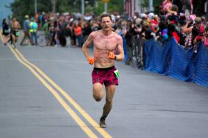Anchorage's Lars Arneson finishes third in the men's Mount Marathon Race on Monday, July 4, 2022, in Seward, Alaska. (Photo by Jeff Helminiak/Peninsula Clarion)