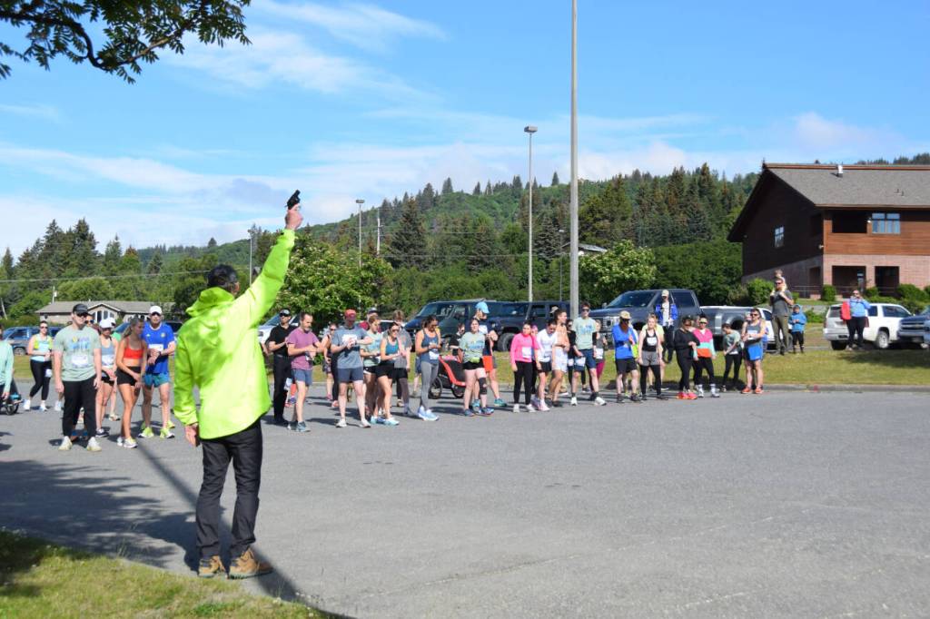 Runners participating in the Homer Spit Run 10K to the Bay wait for the start gun to fire on Saturday, June 29, 2024, at Homer High School in Homer, Alaska. (Delcenia Cosman/Homer News)