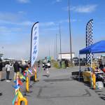 Homers Landon Tinsley dashes across the finish line at Lands End Resort during the Homer Spit Run 10K to the Bay on Saturday, June 29, 2024, in Homer, Alaska. Tinsley came in fourth for the mens group, and was sixth overall in the 10K. (Delcenia Cosman/Homer News)