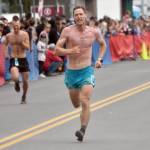 Anchorages Lars Arneson, a 2009 graduate of Cook Inlet Academy, finishes ninth in the mens race at the Mount Marathon Race on Thursday, July 4, 2024, in Seward, Alaska. (Photo by Jeff Helminiak/Peninsula Clarion)