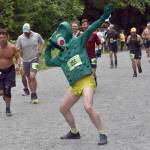 Sewards Patrick Lewis, dressed as Gumby, entertains the crowd during the mens race at the Mount Marathon Race on Thursday, July 4, 2024, in Seward, Alaska. (Photo by Jeff Helminiak/Peninsula Clarion)