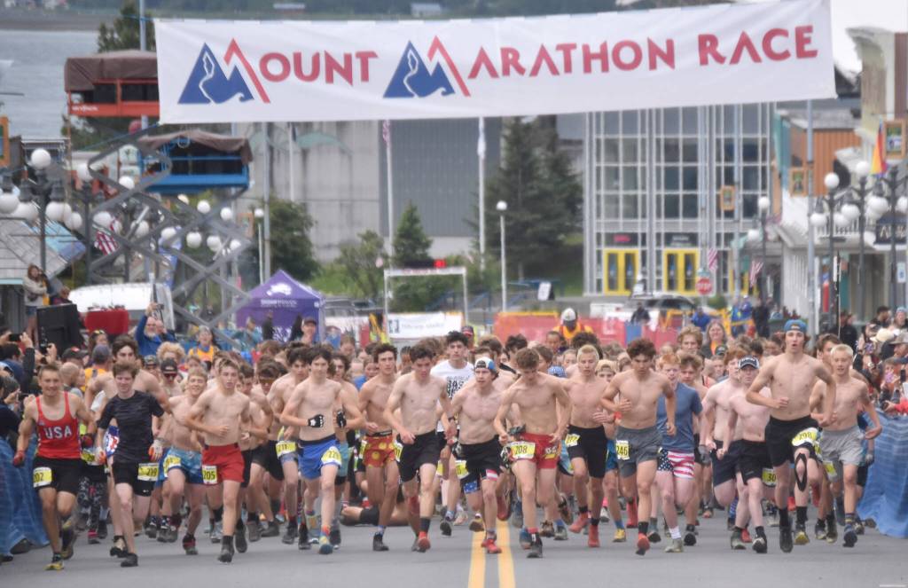The junior race starts Thursday, July 4, 2024, at the Mount Marathon Race in Seward, Alaska. (Photo by Jeff Helminiak/Peninsula Clarion)
