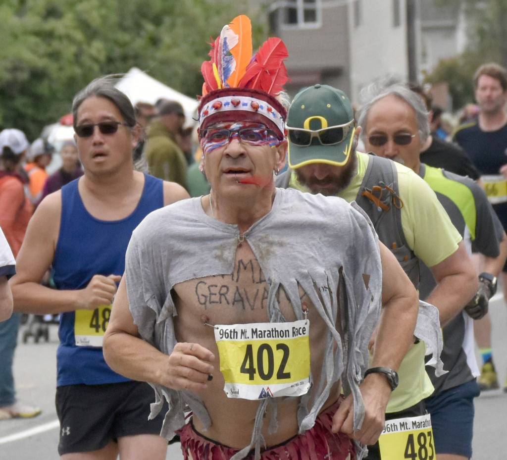 Anchorages Brian Stoecker races the mens race with the bib attached in his customary way at the Mount Marathon Race on Thursday, July 4, 2024, in Seward, Alaska. (Photo by Jeff Helminiak/Peninsula Clarion)